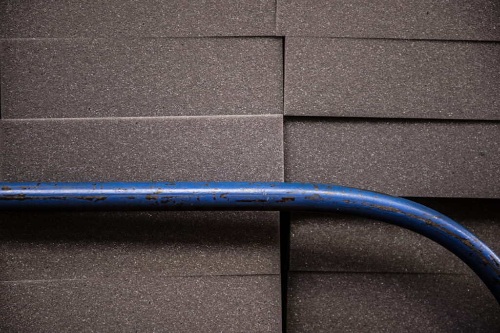 Grey foam packaging blocks stacked on dolly