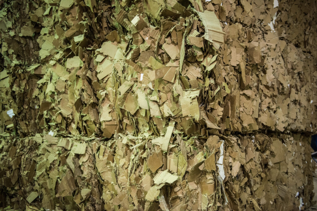 Shredded paper packaging materials
